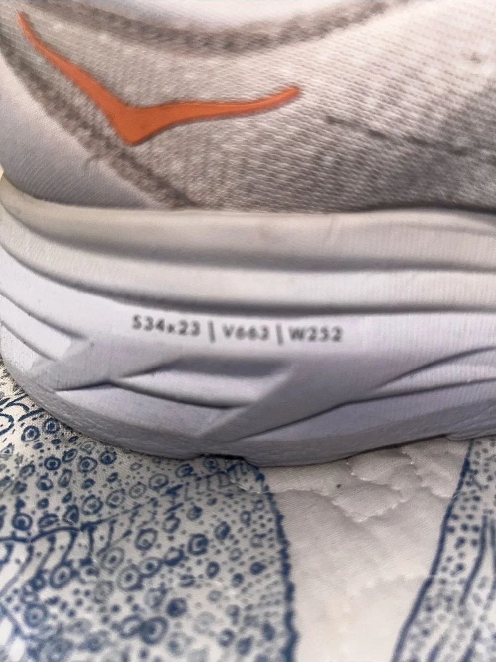 Hoka womens Gray Sneakers with Orange Logo Accents